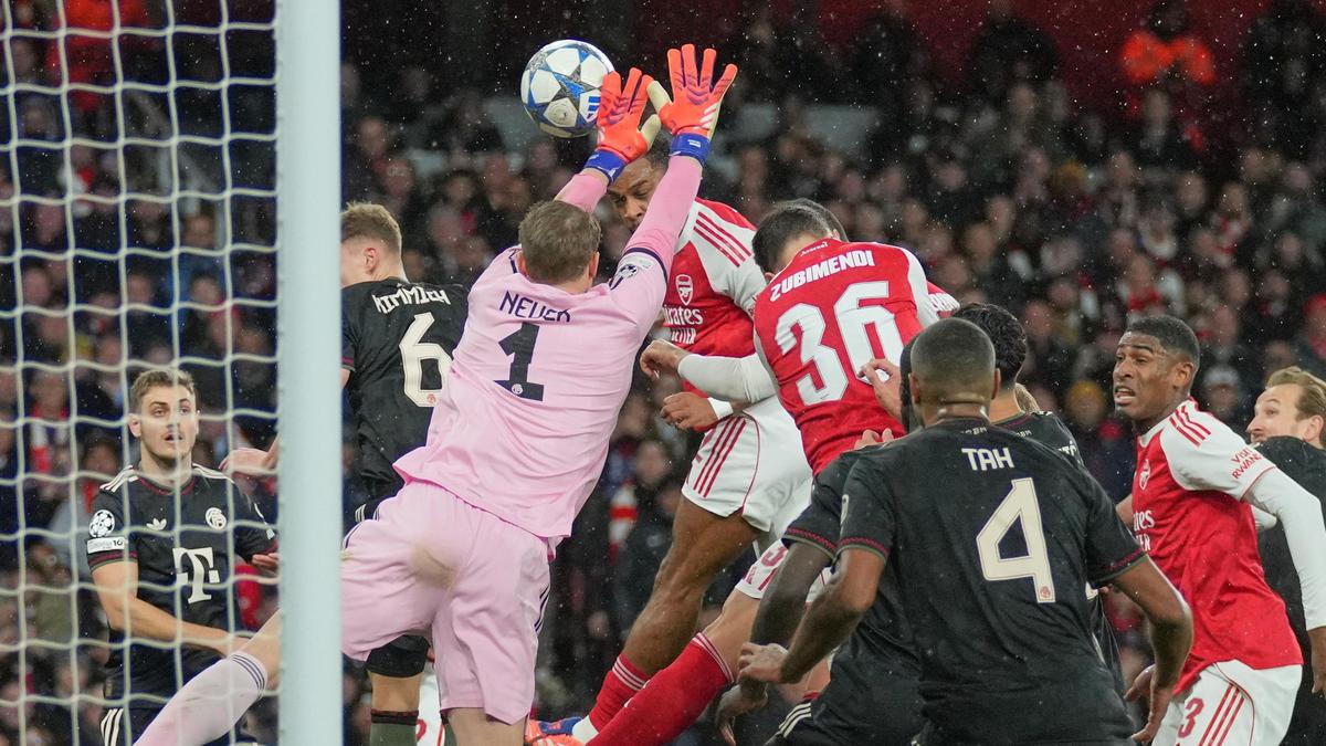 Arsenal defeats Bayern Munich 3-1, securing Champions League top spot