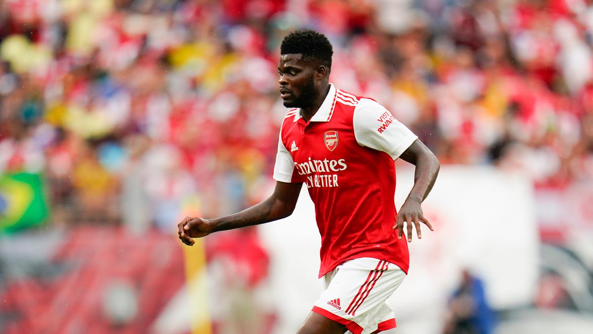 Former Arsenal midfielder Thomas Partey charged with five counts of rape, British police say